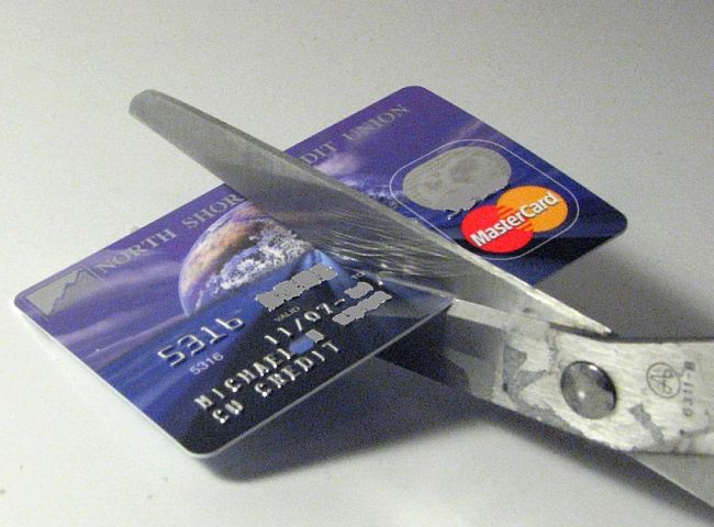 Cut up your credit card - most of which have high interest rates and are far too tempting for over-spending